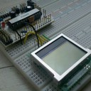 A Bare Bones Board (Arduino clone) with a small LCD.